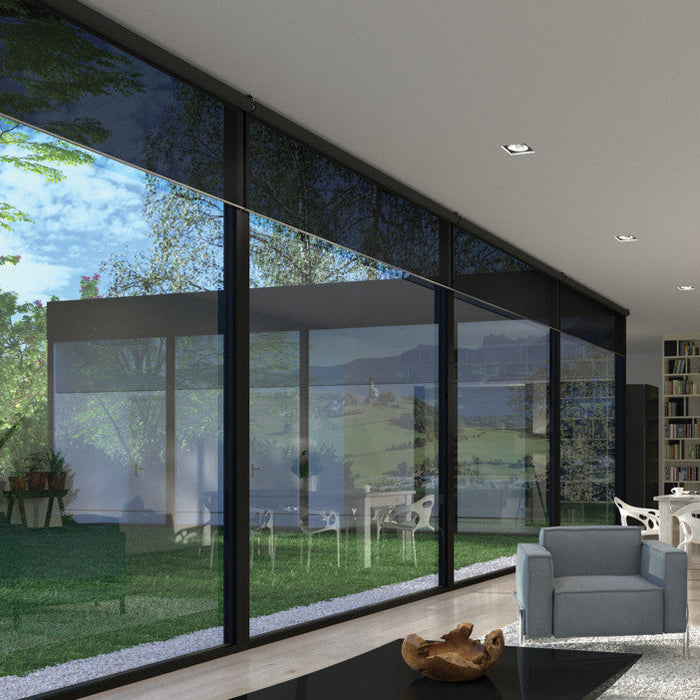 Lutron Palladiom motorised blinds in a wide, sunlit living room