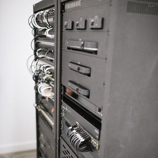 Complete smart home equipment rack with networking gear, audio/video components, power management, and home automation controllers