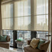 Detail of Crestron roller shade fabric and fascia hardware in a modern interior